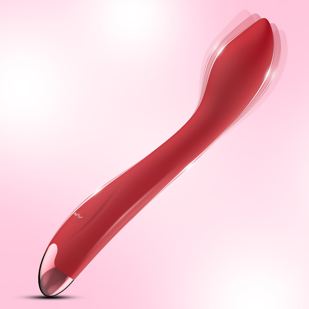 Rotes, gebogenes Sexspielzeug auf Rosa