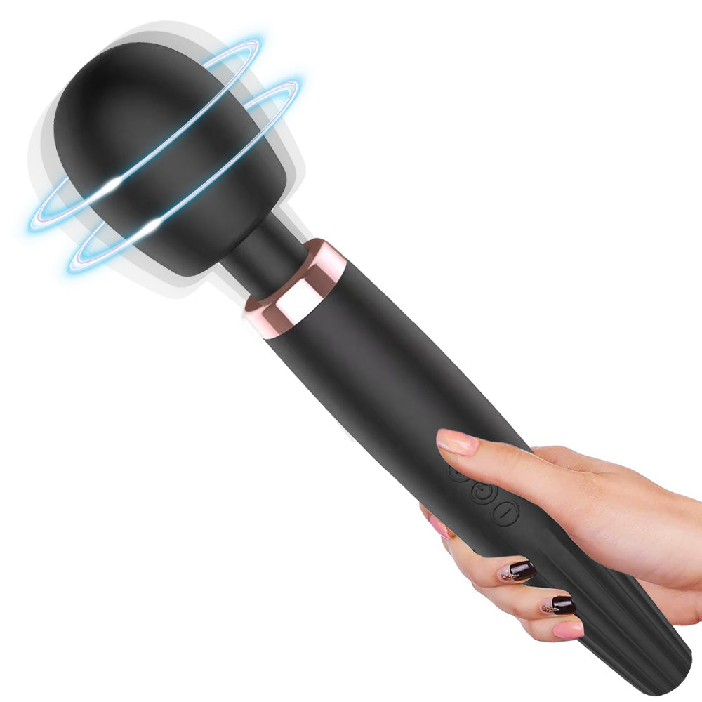 Schwarzer Vibrator in Hand gehalten