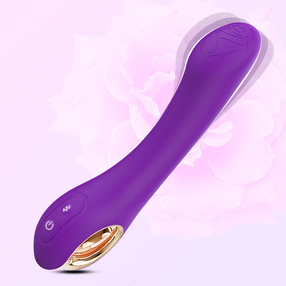 Lila Vibrator vor rosa Hintergrund