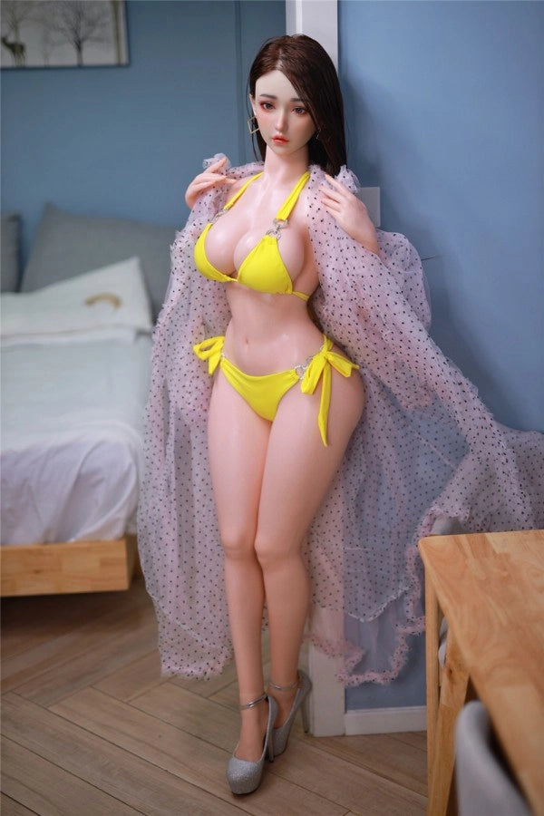 Sexpuppe in gelbem Bikini