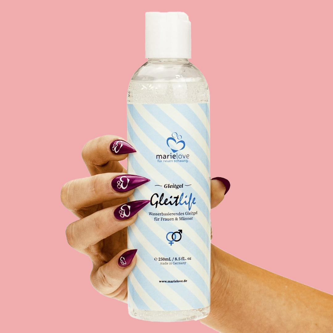 Flasche Gleitgel in Hand gehalten