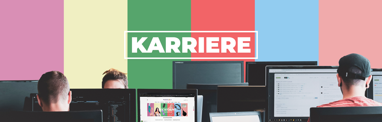 Büroarbeiter vor Computern